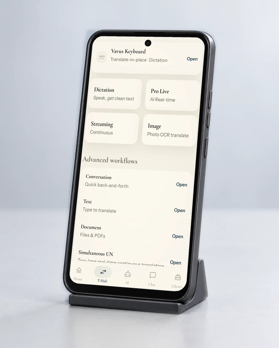 Vavus handheld on a stand showing the app Library.